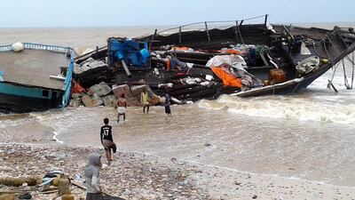 Yemenis inspect a ship wrecked after Cyclone Mekunu hit the island of Socotra, in the Indian Ocean in May 2018. EPA