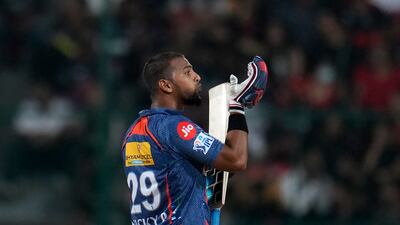 Nicholas Pooran celebrates his fifty. AP