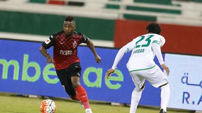 Ismaeel Al Hamadi of Al Ahli, left, goes by Haidar Alo Ali of Emirates. Ramesh / Al Ittihad
