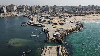 Tents sheltering displaced Palestinians in the war-damaged area surrounding Gaza city's port. AFP