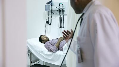 A specialist in emergency medicine visits a patient at the emergency department of Burjeel Hospital n Abu Dhabi. Silvia Razgova / The National