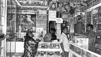 A video and cassette shop specialising in Bollywood films and music from the 1990s-era Abu Dhabi souq. Courtesy: Al Ittihad