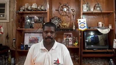 Caretaker Denesh Kumar lives at the RAK Sailing Club and is the host serving refreshments during club activities.