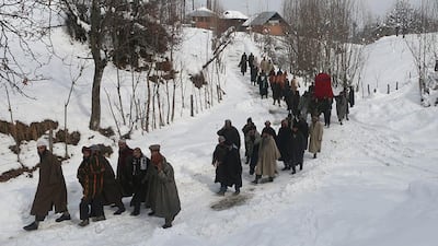 A bride being carried in a palanquin.