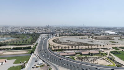 Ms Fersing enjoys the view from the living room