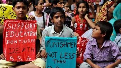Non-governmental organisation Bachpan Bachao Andolan, or Save Childhood Movement, held a protest in New Delhi against the death of pupils after eating a free midday meal served at a school.