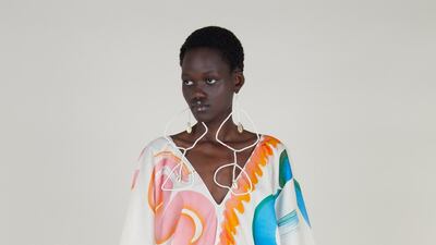 Roland Mouret unveiled his spring line with a paint-daubed kaftan