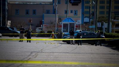 Virginia Beach police work the scene of the shooting. AP
