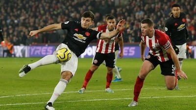 Manchester United's Harry Maguire shoots at goal. Reuters