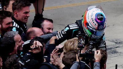 Kimi Antonelli celebrates with his team. Reuters