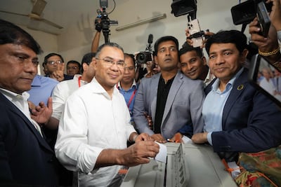Bangladesh Nationalist Party chairman Tarique Rahman, centre, casts his ballot in the elections. AFP
