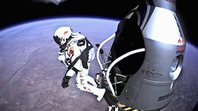 Mr Baumgartner jumps out from the capsule during the final manned flight for Red Bull Stratos in 2012. Reuters