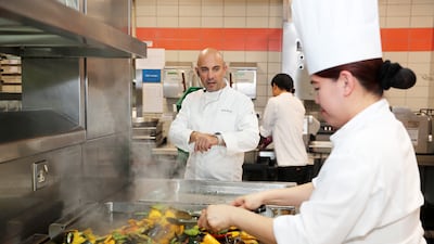 More than 250 kitchen staff work together for the dinner service