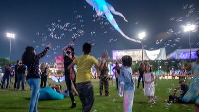 The seven-metre-tall creatures, which perform lively dances to music, are bringing the Expo 2020 Dubai site to life. Victor Besa / The National