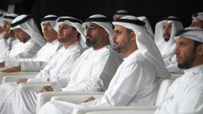 Sheikh Khalid bin Mohamed bin Zayed, Deputy National Security Adviser, centre, attends Abu Dhabi's Ghadan 21 initiative with Dr Ahmed Al Mazrouei, Secretary General of the Abu Dhabi Executive Council left,, and Sheikh Theyab bin Mohamed bin Zayed, Chairman of the Department of Transport, right. Hamad Al Kaabi / Ministry of Presidential Affairs