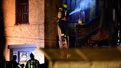 Firefighters tackle a fire at Camden Market in north London, Britain, July 10, 2017. REUTERS/Hannah McKay