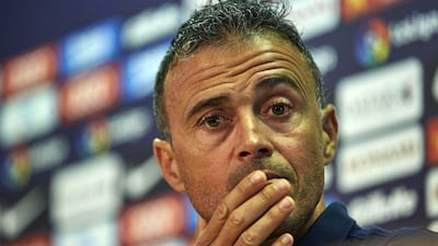 Luis Enrique takes his Barcelona team to face Pep Guardiola's Manchester City on Tuesday. Alejandro Garcia / EPA