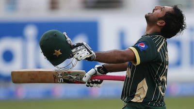 Pakistani batsman Sarfraz Ahmed celebrates after he scored half a century during the second one day international match between Australia and Pakistan in Dubai, United Arab Emirates, Friday, Oct. 10, 2014. AP Photo/Kamran Jebreili