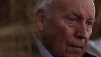 The former vice president listens to his daughter's remarks. AFP