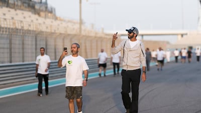 In 2018, Sheikh Shakhbout bin Nahyan walks around Yas Marina Circuit in Abu Dhabi. Reem Mohammed / The National
