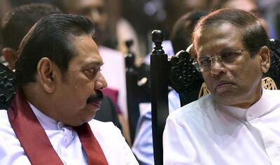 Mahinda Rajapaksa, left, with Sri Lankan President Maithripala Sirisena. AFP