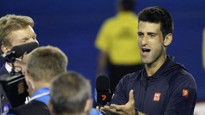 Novak Djokovic in full song after beating Fernando Verdasco in the third round of the Australian Open. Lee Jin-man/AP