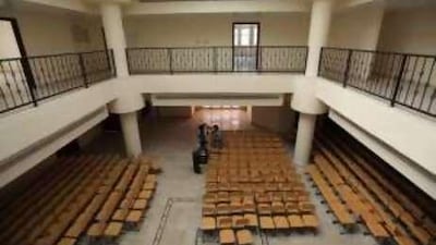 Inside Musaffah's Private International English School, chairs are set up ready for pupils.
