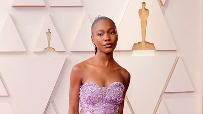 Demi Singleton, wearing purple Miu Miu. AFP