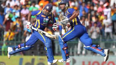 Kumar Sangakkara, right, and Mahela Jayawardene, left, will lead Sri Lanka's batting attack at the Cricket World Cup. Gemunu Amarasinghe / AP