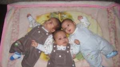 The Bakari triplets, Suhail, Ali and Halla. two of the boys died on Saturday; Halla, right, is recovering in an Ajman hospital.