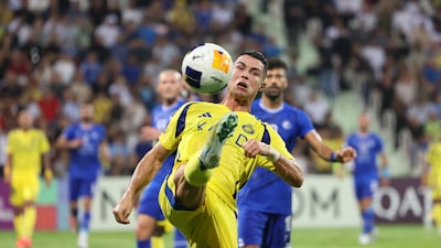 Al Nassr's Cristiano Ronaldo controls the ball against Esteghlal.