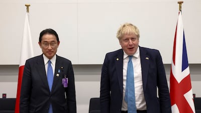 Japan’s Prime Minister Fumio Kishida, left, and Britain’s Prime Minister Boris Johnson attend a bilateral meeting during a Nato summit in Brussels, Belgium, on Thursday March 24, 2022 to discuss Russia’s invasion of Ukraine. AP