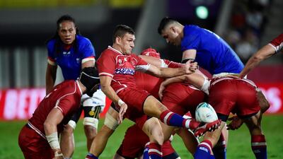 Russia's Vasily Dorofeev clearing the ball against Samoa. REUTERS