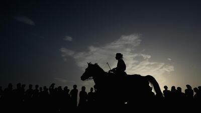 Rides are shown in silhouette at the event. Getty