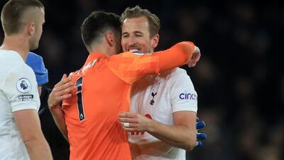 Tottenham goalkeeper Hugo Lloris congratulates Harry Kane. AFP