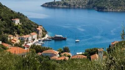 Book a luxurious holiday home on the Greek island of Ithaca for a week of boating, swimming, cycling and yoga. Getty Images