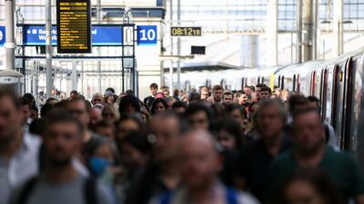 Passengers disembark at Waterloo station, after arriving on one of the few running passenger trains. Bloomberg