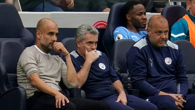 Manchester City manager Pep Guardiola, left, with assistants Juanma Lillo, centre, and Rodolfo Borrell. Getty