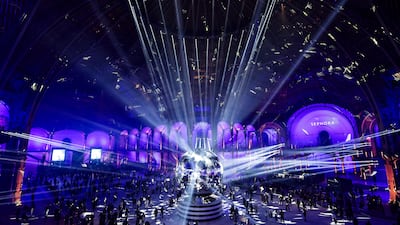 People skate on the world's largest indoor ice rink at the Grand Palais in Paris. AFP