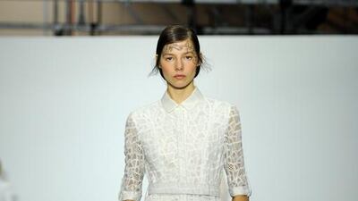 A model walks the runway at the Bora Aksu show. Eamonn M. McCormack / Getty Images