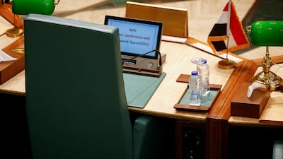 The empty chair of the Syrian delegate during the opening session of an Arab League meeting of foreign ministers in Cairo. Reuters