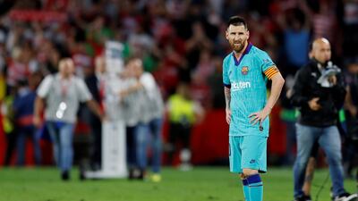 Barcelona's Lionel Messi looks dejected after the match. Reuters
