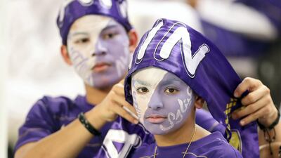 Al Ain fans get ready for the first leg of their Asian Champions League quarter-final against Al Hilal at Hazza bin Zayed Stadium. Chris Whiteoak / The National