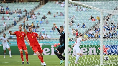 Wales appeal for a goal scored by Mario Gavranovic of Switzerland that was later disallowed. Getty