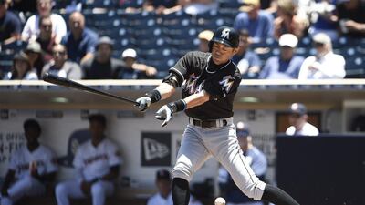 Ichiro Suzuki of the Miami Marlins hits a single during the first inning of a baseball game against the San Diego Padres at Petco Park on June 15, 2016 in San Diego, California. Denis Poroy/Getty Images/AFP