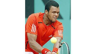 Jo-Wilfried Tsonga, of France, was lucky to make it through the opening day, pushed hard by Germany's Daniel Brands in five sets, and the player was not happy with the organisers.