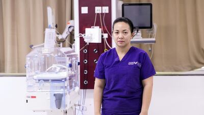 Myann Abis, a neonatal ICU nurse at Universal Hospital in Abu Dhabi, hopes to adopt Sebastian, a baby boy whose mother abandoned him last year. Reem Mohammed / The National