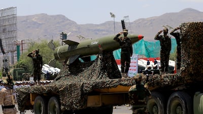 Houthi soldiers stand guard on a missile carrier during an official military parade in Sanaa. AFP
