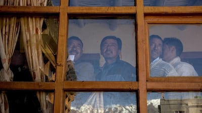 Ladkahis wait inside a polling station to vote near the Thiksey Monastery.