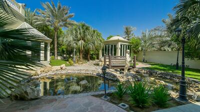 The sprawling landscaped garden. Photo: Engel and Voelkers